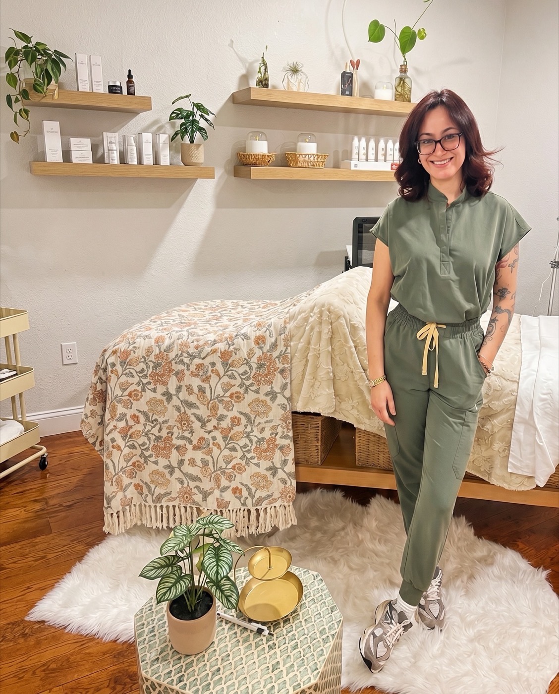 Corey in the Skin by Corey treatment room with skincare products and a treatment bed